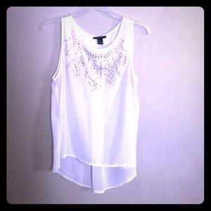 White sleeveless blouse